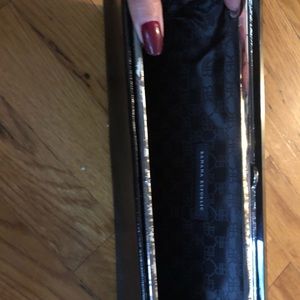 Clutch,USED. silver by the opening is tarnished.